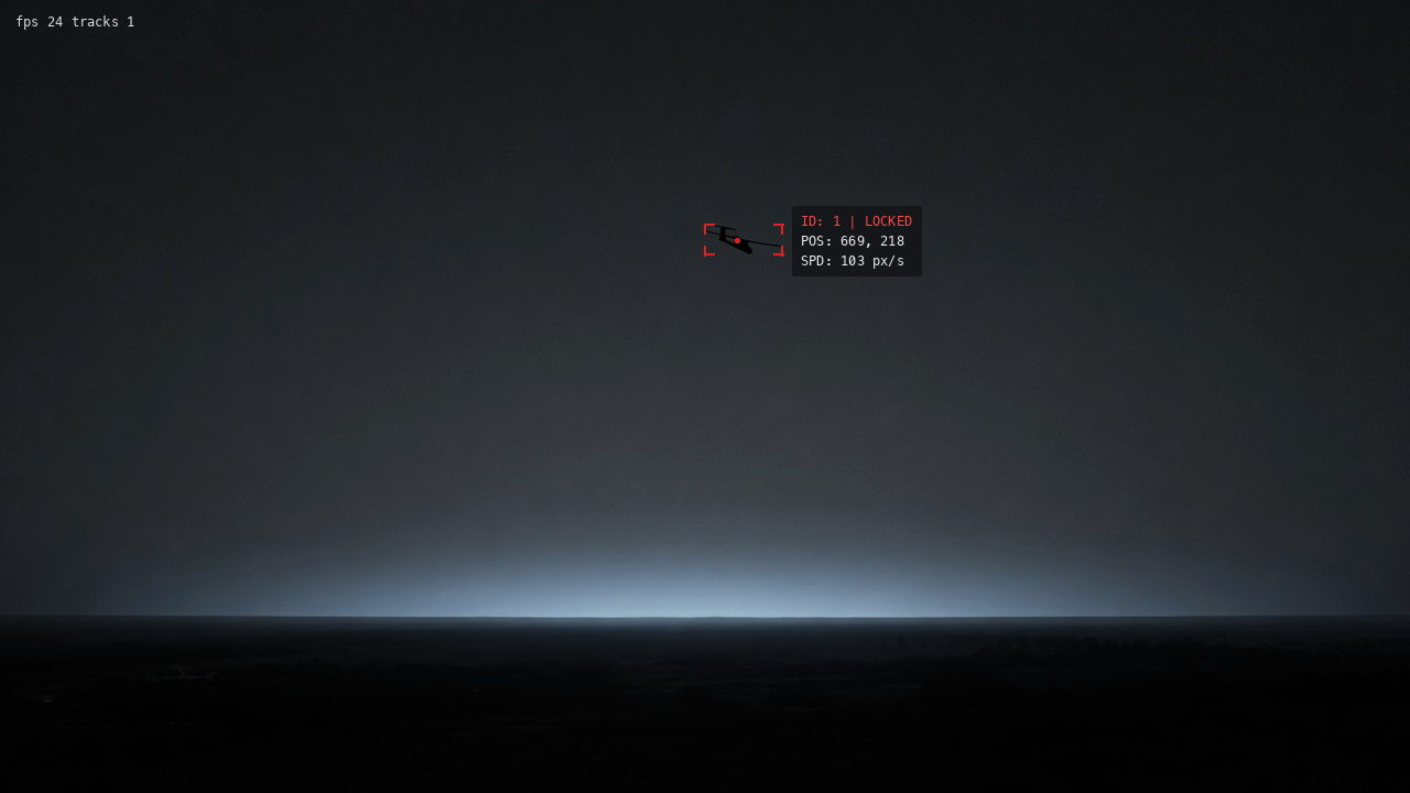 Sky Tracker lock on a small aircraft: red corner brackets, ID, position, and speed on dark sky footage